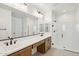 Spacious bathroom showcasing a walk-in shower and double sink vanity at 26029 N 23Rd Ave, Phoenix, AZ 85085