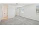 Bright bedroom with neutral carpet and multiple windows providing ample natural light at 26029 N 23Rd Ave, Phoenix, AZ 85085