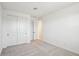 Bedroom with carpet, a closet, and a doorway at 26029 N 23Rd Ave, Phoenix, AZ 85085