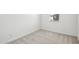 A room with carpet and a small window with blinds at 26029 N 23Rd Ave, Phoenix, AZ 85085