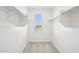 Walk-in closet featuring a bright window and closet rods at 26029 N 23Rd Ave, Phoenix, AZ 85085