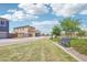 Beautiful community featuring grass lawns, sidewalks, lush trees and a shaded bench to enjoy the scenery at 26029 N 23Rd Ave, Phoenix, AZ 85085