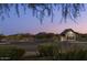 Union Park entrance with dark sky, mountain views, and manicured bushes at 26029 N 23Rd Ave, Phoenix, AZ 85085