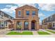 Charming two-story home featuring a well-manicured front yard and inviting entryway at 26029 N 23Rd Ave, Phoenix, AZ 85085
