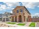 Inviting two-story house showing landscaped front, covered entry with archways and new turf at 26029 N 23Rd Ave, Phoenix, AZ 85085