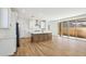 Stylish open kitchen with wood floors and island at 26029 N 23Rd Ave, Phoenix, AZ 85085