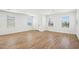 Bright and airy living room offers wood floors and recessed lighting at 26029 N 23Rd Ave, Phoenix, AZ 85085
