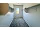 Walk-in closet featuring a single window and shelving racks at 26029 N 23Rd Ave, Phoenix, AZ 85085