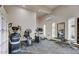 Well-equipped gym featuring modern exercise machines and ample natural light at 2637 E Beekman Pl, Phoenix, AZ 85016