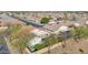 Aerial view featuring the home with a terracotta roof, private yard, and neighborhood streets at 3037 S Coyote Cyn, Mesa, AZ 85212