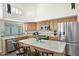 Bright kitchen featuring stainless steel appliances, granite countertops, and ample cabinet space at 3037 S Coyote Cyn, Mesa, AZ 85212