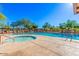 A relaxing community pool and spa, surrounded by lush greenery and comfortable lounge chairs at 34916 N 31St Ave, Phoenix, AZ 85086