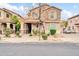 Charming two-story home featuring stone accents, desert landscaping, and neutral color palette at 34916 N 31St Ave, Phoenix, AZ 85086