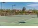 Well-kept community tennis court surrounded by desert landscaping, perfect for tennis enthusiasts at 34916 N 31St Ave, Phoenix, AZ 85086