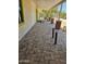 Paver patio with a covered area and unique post decor at 4002 N 58Th Dr, Phoenix, AZ 85031