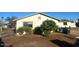 Side yard featuring refreshed landscaping, new vegetation, and a fenced-in area at 4002 N 58Th Dr, Phoenix, AZ 85031