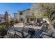 Inviting backyard with outdoor seating, fire pit, and lush landscaping, ideal for relaxing or entertaining at 4033 E Wildcat Dr, Cave Creek, AZ 85331