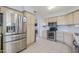 Modern kitchen with stainless steel appliances, ample counter space, and tile flooring at 4033 E Wildcat Dr, Cave Creek, AZ 85331