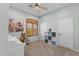 Bedroom with carpet and natural light, a ceiling fan and closet storage at 41802 N Bridlewood Way, Anthem, AZ 85086