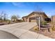 Attractive single-story home with a well-manicured desert landscape and a spacious driveway at 41802 N Bridlewood Way, Anthem, AZ 85086