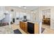 Kitchen island with granite countertop and wooden cabinetry provides ample space for culinary activities at 41802 N Bridlewood Way, Anthem, AZ 85086