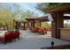 Comfortable outdoor patio area with cozy seating and stylish decor at 41802 N Bridlewood Way, Anthem, AZ 85086