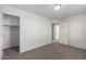 An additional view of the bedroom showcasing the closet and doorways at 5462 W Fulton St, Phoenix, AZ 85043