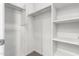 Bright walk-in closet features shelving and hanging space for optimal storage at 5462 W Fulton St, Phoenix, AZ 85043