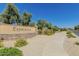 Esperanza community entrance with stone monument and landscaping, under a bright blue sky at 6271 S Twilight Ct, Gilbert, AZ 85298