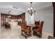 Dining area with a table and chairs is positioned next to a modern kitchen with stainless steel appliances at 7175 E Camelback Rd # 1106, Scottsdale, AZ 85251