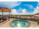 Relaxing rooftop hot tub offers city views, comfortable seating, and clear skies at 7175 E Camelback Rd # 1106, Scottsdale, AZ 85251