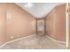 Bedroom with neutral carpet, fan and window with neutral curtains for natural light at 7810 W Wescott Dr, Glendale, AZ 85308