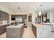 Spacious kitchen with double islands, stainless steel appliances, and wood cabinetry at 9776 E Granite Peak Trl, Scottsdale, AZ 85262