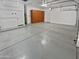 Spacious garage with installed overhead storage and room for two cars at 10320 W Cashman Dr, Peoria, AZ 85383