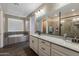 Beautiful bathroom featuring a soaking tub and double sink vanity with granite countertops at 10617 E Durant Dr, Mesa, AZ 85212