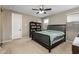 Bedroom with neutral paint, ceiling fan, and natural light coming in from the window with blinds at 10617 E Durant Dr, Mesa, AZ 85212