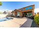 Inviting backyard pool and patio area, perfect for outdoor entertaining and relaxation at 10816 W Nosean Rd, Peoria, AZ 85383