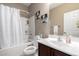 Well-lit bathroom featuring a shower-tub combo and a single sink at 10816 W Nosean Rd, Peoria, AZ 85383