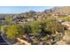 Expansive aerial view of neighborhood homes with desert landscaping and mountain backdrop at 11496 E Pine Valley Rd, Scottsdale, AZ 85255