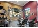 Fitness center with exercise equipment and a view of the pool area at 11640 N Tatum Blvd # 1052, Phoenix, AZ 85028