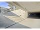 Bright, clean parking garage entrance, showing well-maintained concrete and access to the building at 11640 N Tatum Blvd # 1052, Phoenix, AZ 85028