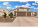 Charming two-story home with a three car garage, tile roof and beautifully landscaped yard at 1252 N Jackson St, Gilbert, AZ 85233