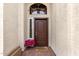 Close-up of the front door showing holiday decor and a decorative glass insert at 1252 N Jackson St, Gilbert, AZ 85233