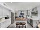 Well-lit kitchen showcasing a farmhouse sink, stainless steel appliances, and wood island at 1252 N Jackson St, Gilbert, AZ 85233