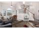 Bright living and dining area featuring an elegant staircase and natural light at 1252 N Jackson St, Gilbert, AZ 85233