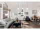 Bright and airy living room featuring high ceilings, modern decor, and hardwood floors at 1252 N Jackson St, Gilbert, AZ 85233