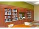 Cozy library with built-in shelving, books, and reading nooks at 13070 W Eagle Talon Trl, Peoria, AZ 85383