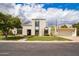 Stunning two-story home featuring a well-manicured lawn and attached two car garage at 1327 W Glendale Ave, Phoenix, AZ 85021