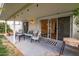 Relaxing covered patio with outdoor furniture and a view of the yard at 1327 W Glendale Ave, Phoenix, AZ 85021