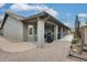 Covered patio along the rear of the house shows plenty of space for entertainment at 14458 W Powderhorn Dr, Surprise, AZ 85374